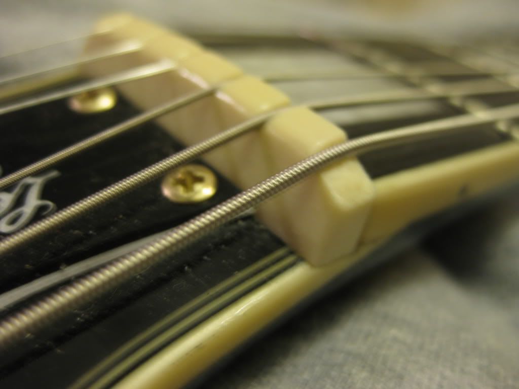 low E string Buzzing after change. My Les Paul Forum