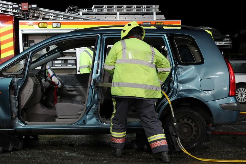 The powerful "Jaws of life" are used to cut through the Mazdas pillars The powerful "Jaws of life" are used to cut through the Mazdas pillars