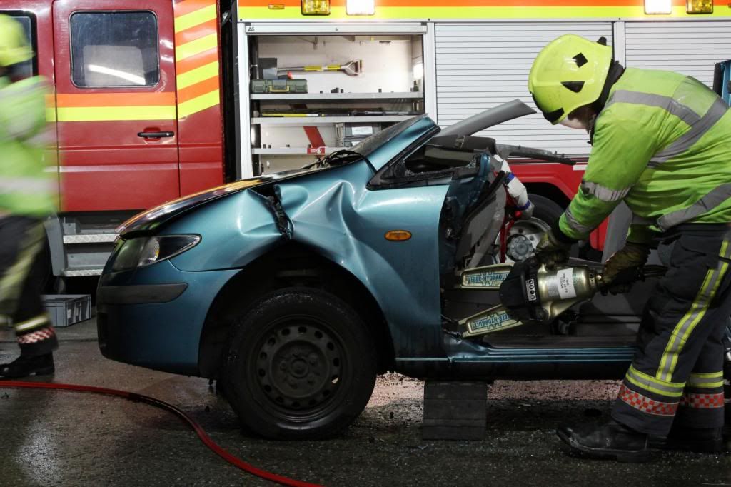 The Jaws of Life are used to prise apart the 2 halfs of the car, to release the casualties legs The Jaws of Life are used to prise apart the 2 halfs of the car, to release the casualties legs